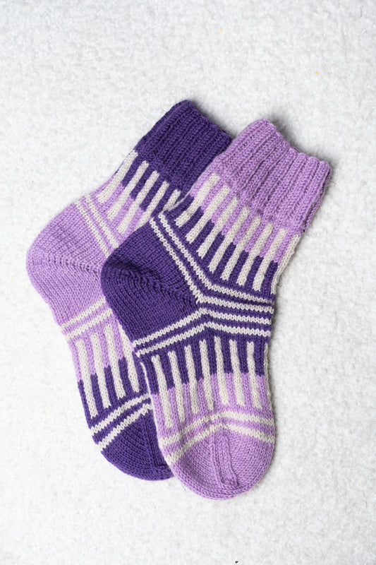 Enschede Socks. A Playful Colorwork Knitting Pattern for Mini Skeins