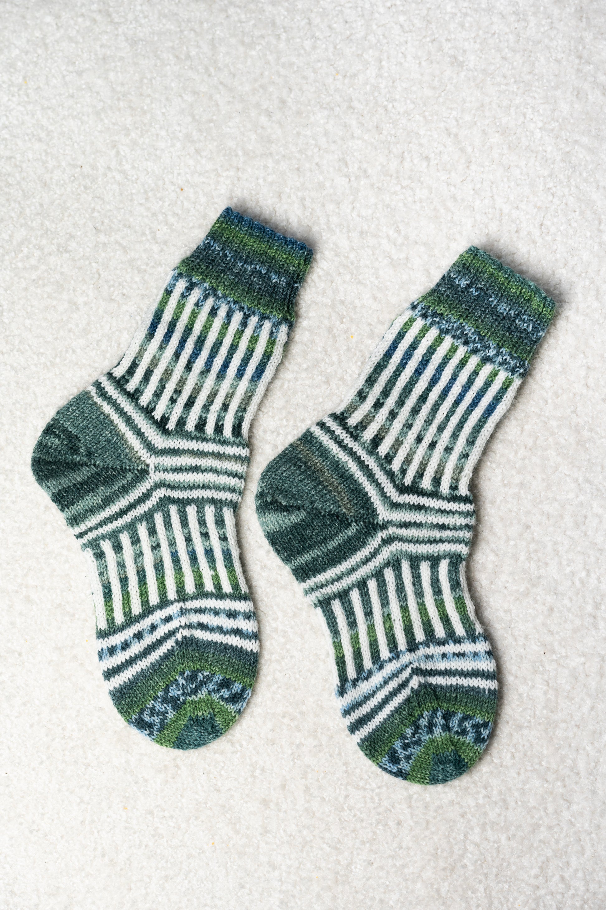 Enschede Socks. A Playful Colorwork Knitting Pattern for Mini Skeins